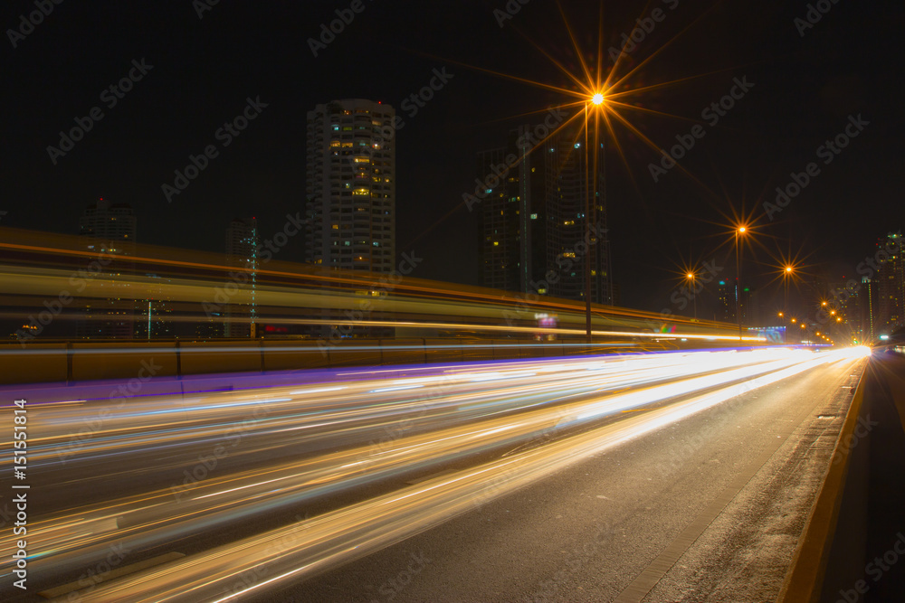 Car light on Taksin Bridge on night time ,Bangkok ,Thailand