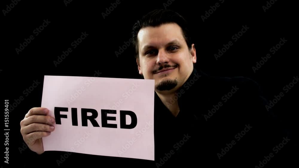 The employee is fired but he is still smiling. The employee is fired but he is still smiling.