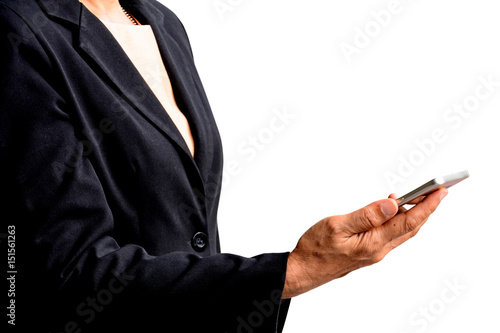 Old lady wearing a black suit holding a mobile isolated