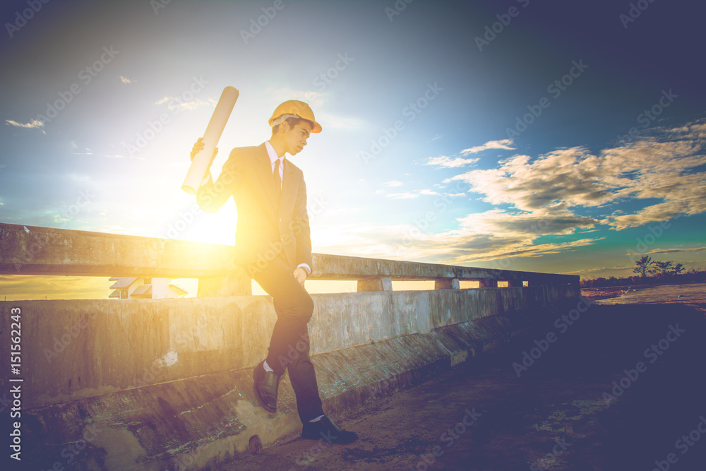 Fototapeta premium Young Engineer inspect dam reservoir. Business Industrial concept.