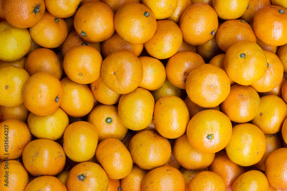 Fresh oranges from orchard on market for background. Fresh oranges from orchard on market for background.