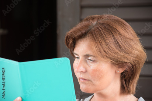 A woman reading the electronic book