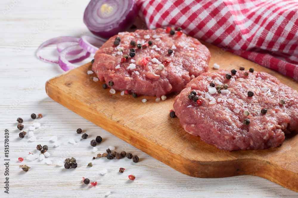 raw home-made beef burger cutlet raw home-made beef burger cutlet
