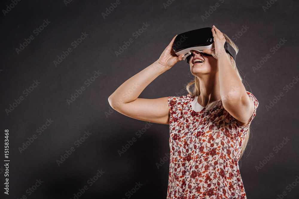 female with glasses of virtual reality. VR headset glasses device. Future technology concept. female with glasses of virtual reality. VR headset glasses device. Future technology concept.