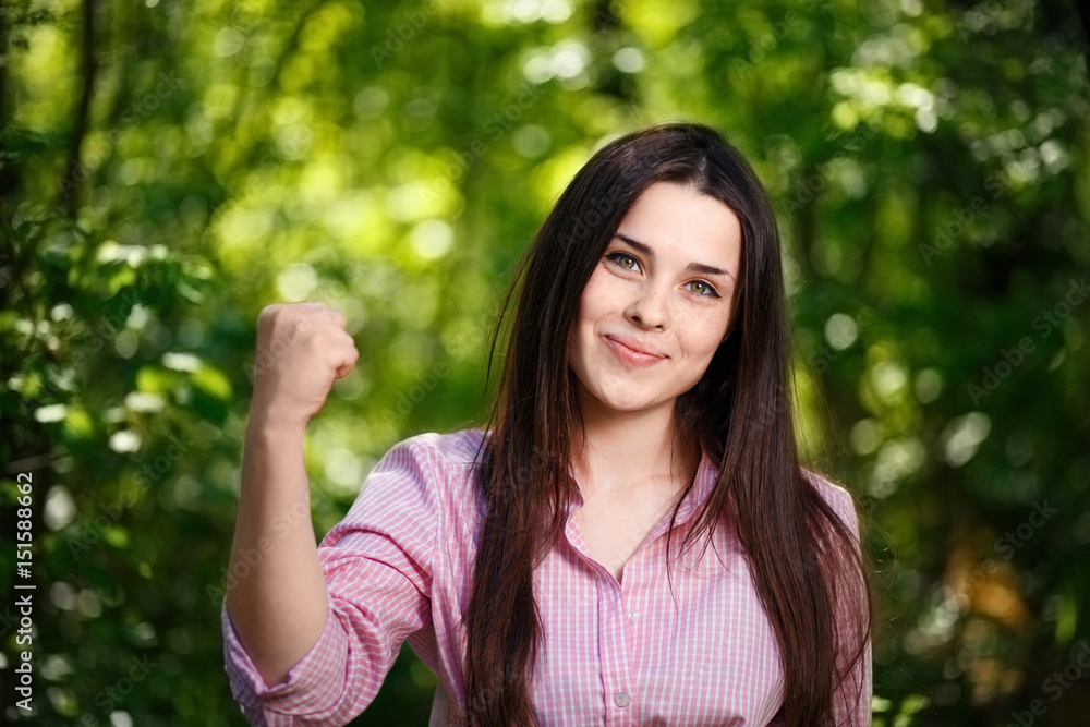 Portrait of happy young smiling exulting woman enjoying life Portrait of happy young smiling exulting woman enjoying life