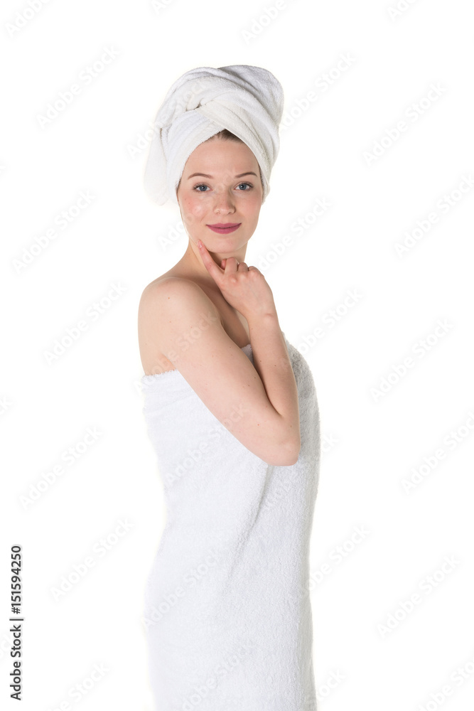 Young beautiful, pretty girl with towel. Ready for massage and skin cosmetic treatment. Studio portrait shot. Pure white background Young beautiful, pretty girl with towel. Ready for massage and skin cosmetic treatment. Studio portrait shot. Pure white background