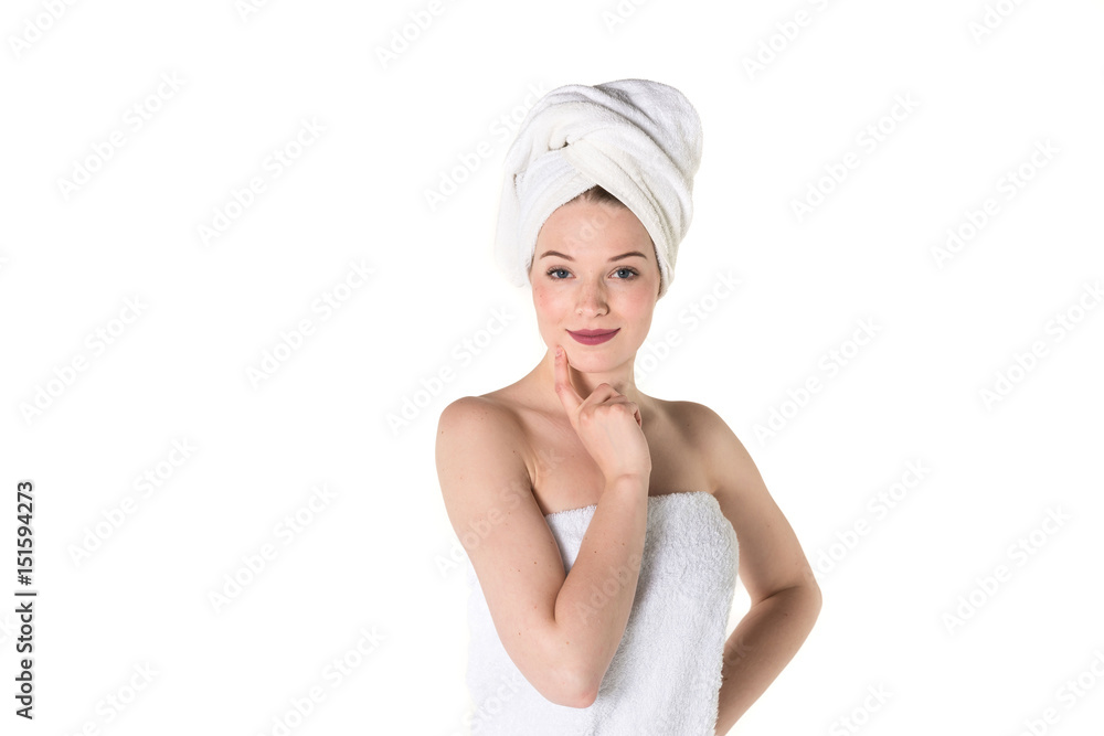Young beautiful, pretty girl with towel. Ready for massage and skin cosmetic treatment. Studio portrait shot. Pure white background Young beautiful, pretty girl with towel. Ready for massage and skin cosmetic treatment. Studio portrait shot. Pure white background