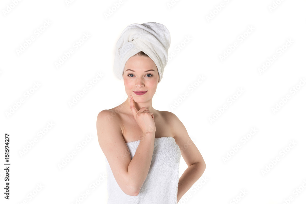 Young beautiful, pretty girl with towel. Ready for massage and skin cosmetic treatment. Studio portrait shot. Pure white background Young beautiful, pretty girl with towel. Ready for massage and skin cosmetic treatment. Studio portrait shot. Pure white background