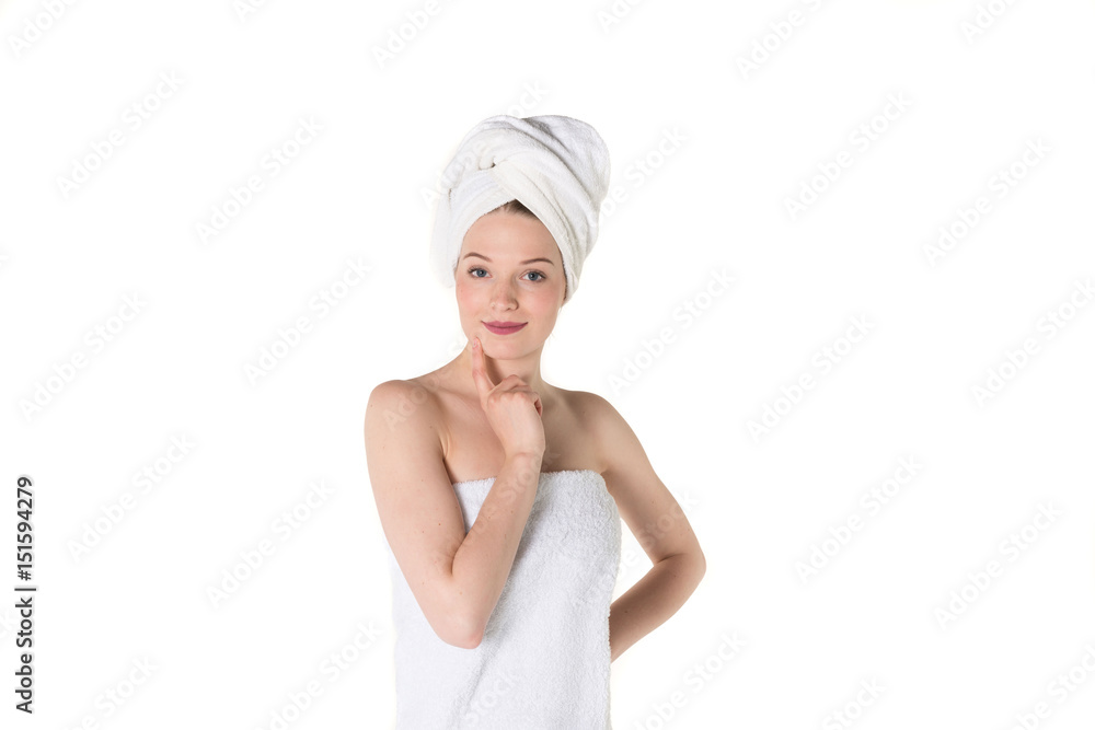 Young beautiful, pretty girl with towel. Ready for massage and skin cosmetic treatment. Studio portrait shot. Pure white background Young beautiful, pretty girl with towel. Ready for massage and skin cosmetic treatment. Studio portrait shot. Pure white background