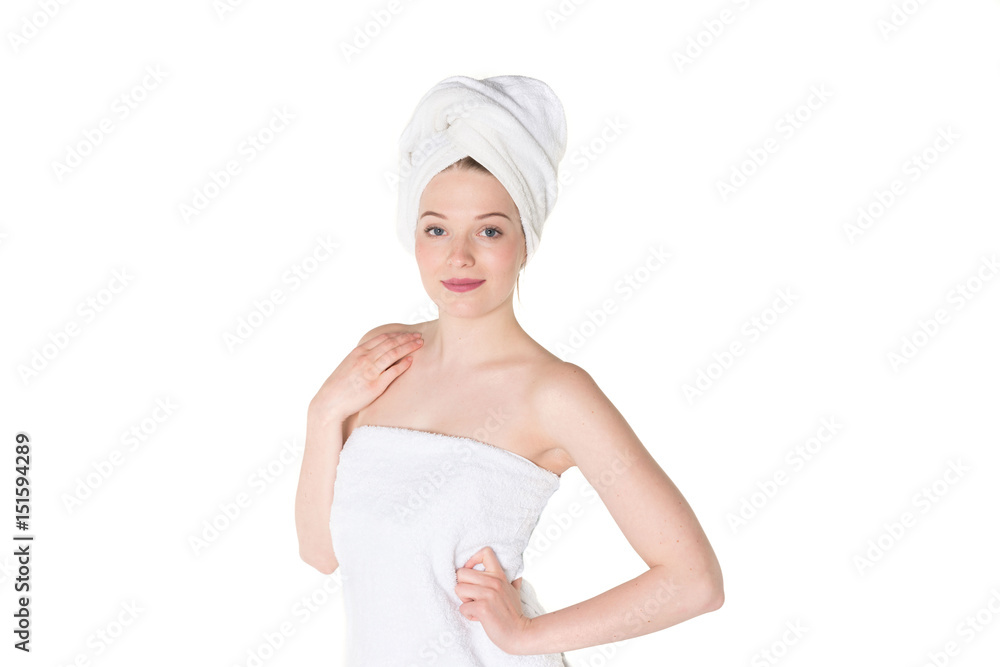 Young beautiful, pretty girl with towel. Ready for massage and skin cosmetic treatment. Studio portrait shot. Pure white background Young beautiful, pretty girl with towel. Ready for massage and skin cosmetic treatment. Studio portrait shot. Pure white background