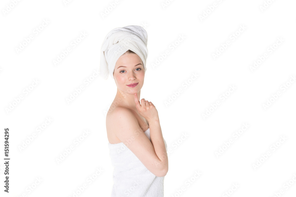 Young beautiful, pretty girl with towel. Ready for massage and skin cosmetic treatment. Studio portrait shot. Pure white background Young beautiful, pretty girl with towel. Ready for massage and skin cosmetic treatment. Studio portrait shot. Pure white background
