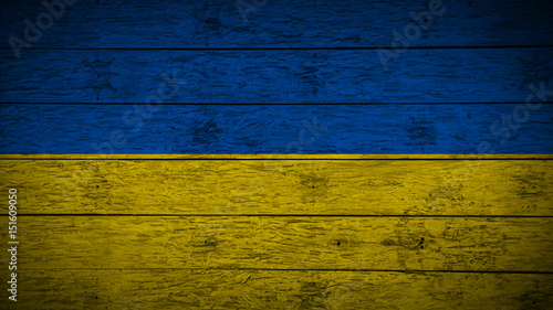 Flag of Ukraine on old wood boards