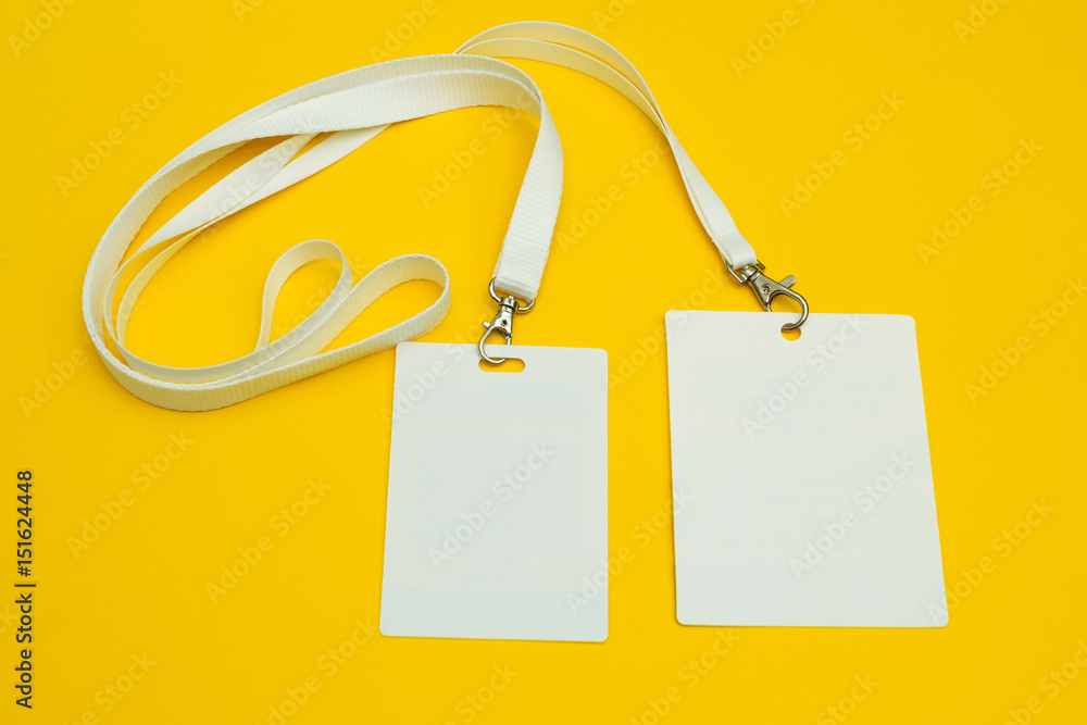 Set of a name label on a yellow background. Space for text and design. Close-up. Set of a name label on a yellow background. Space for text and design. Close-up.