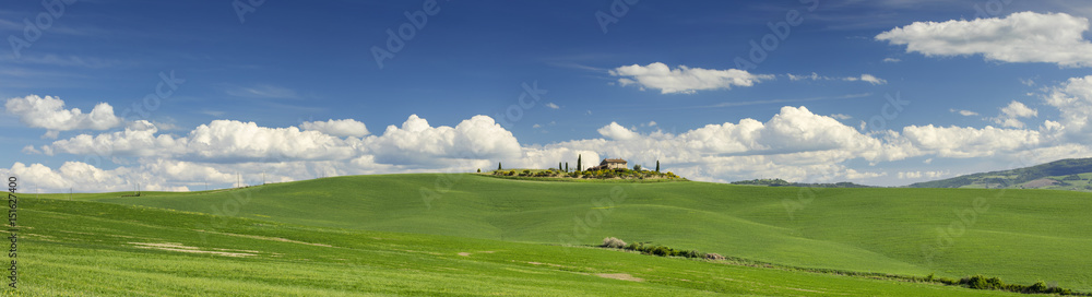 panorama of lonely tuscany village on the green hill panorama of lonely tuscany village on the green hill