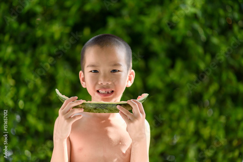 Boy eating watermelon