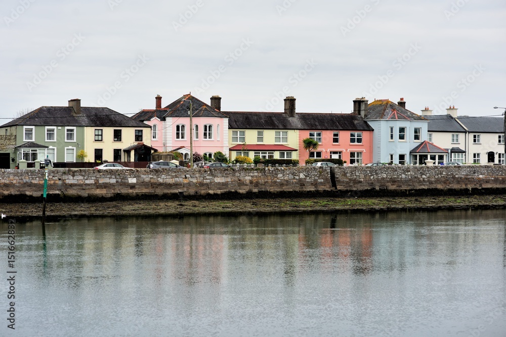 Buildings lining a portion of Dungarvan Harbor in Dungarvan, County Waterford, Ireland.