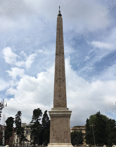 Flaminio Obelisk (Obelisco Flaminio) in the Piazza del Popolo in Rome, Italy. Obelisk is from Pharaoh Ramses II of Egypt, 13th Century BC. Erected in the piazza by Pope Sixtus V.