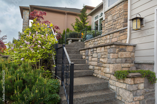 House Front Cultured Stone Work Siding and Stair photo