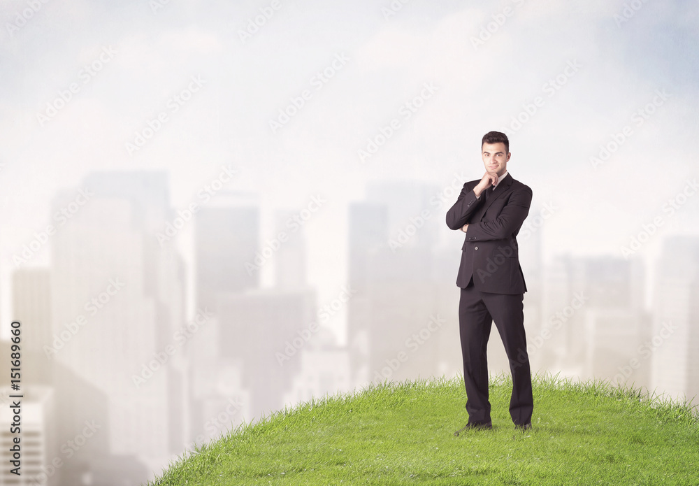 man standing in front of city landscape man standing in front of city landscape