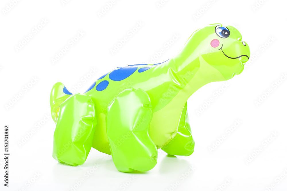 Fototapeta premium Green dinosaur inflatable floating water toy