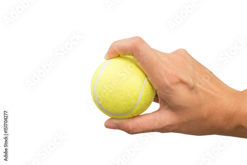 Holding tennis ball isolated on white background.