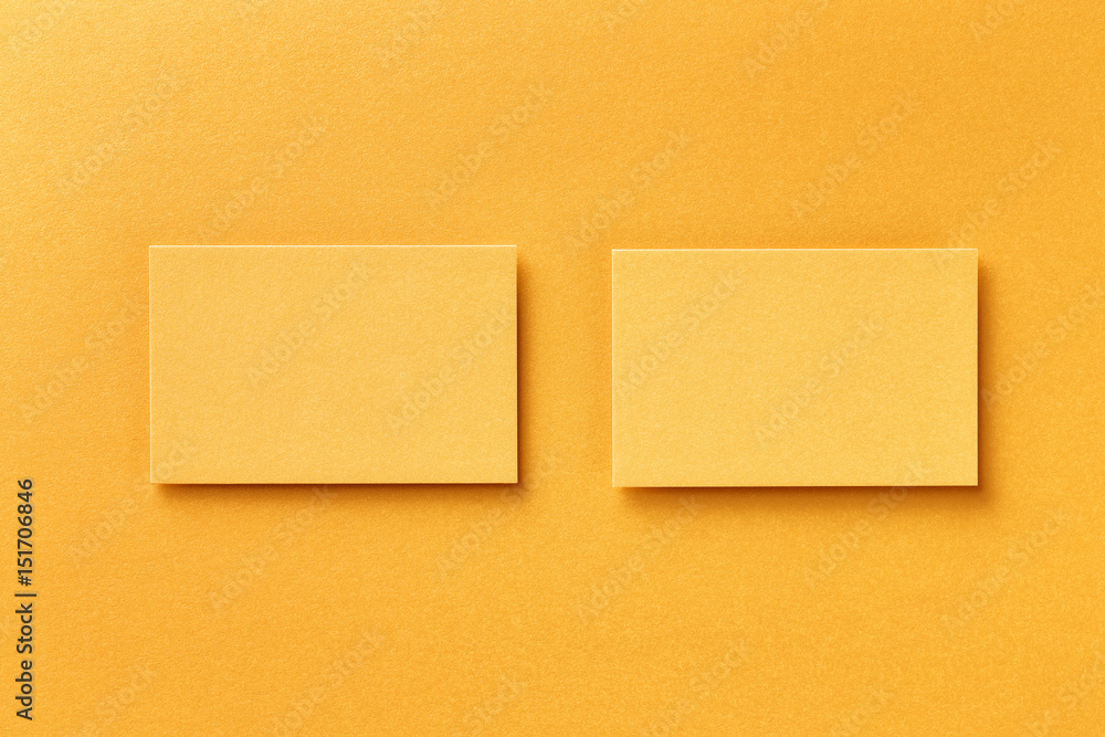 Mockup of two horizontal business cards at golden foil paper background. Mockup of two horizontal business cards at golden foil paper background.