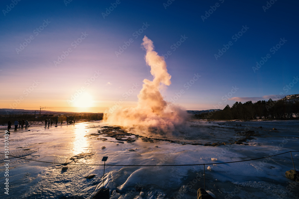 Fototapeta premium Stunning sunrise over geysir strokkur on winter iceland