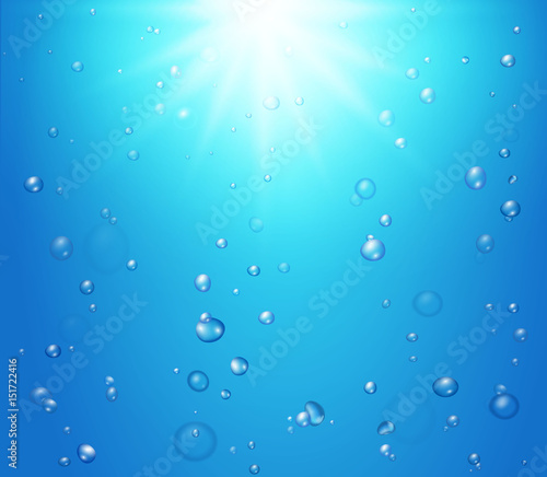 Fizzing air bubbles on blue underwater shiny background. Sea sparkles