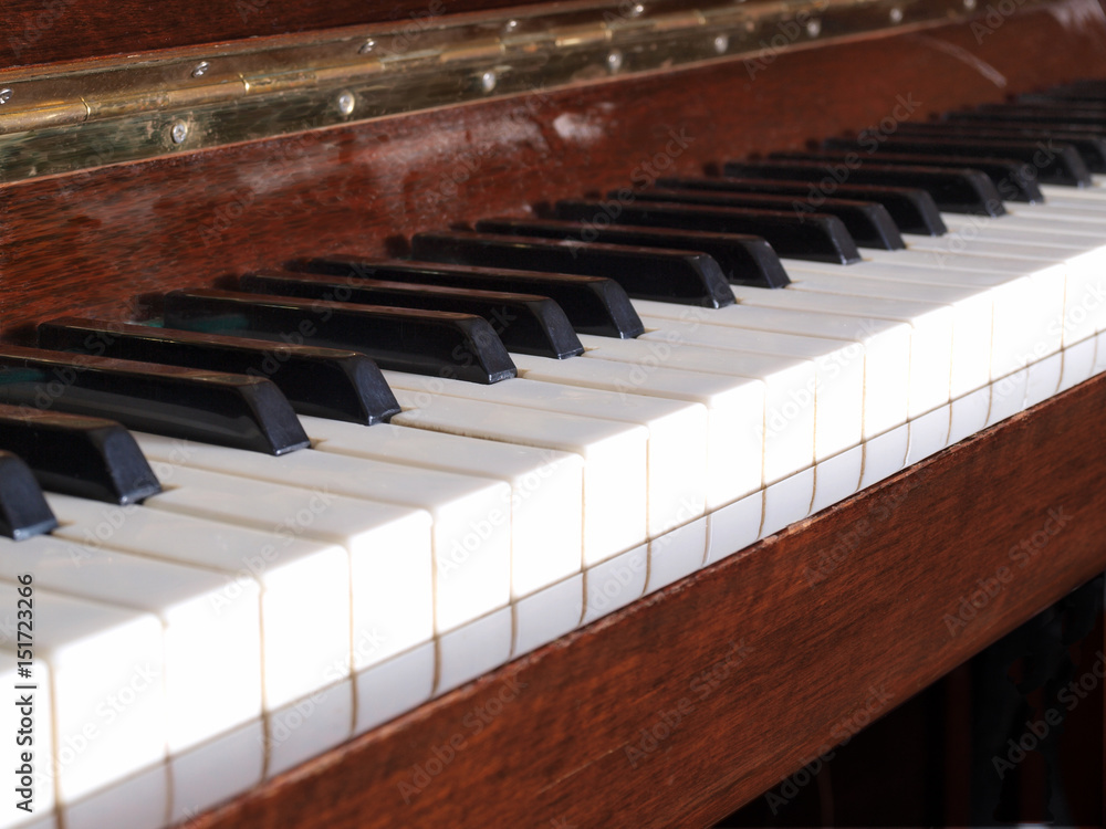 Old piano keys on a dark background Old piano keys on a dark background