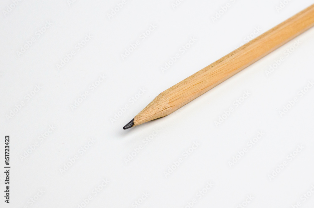 The wooden pencil isolated on white background The wooden pencil isolated on white background