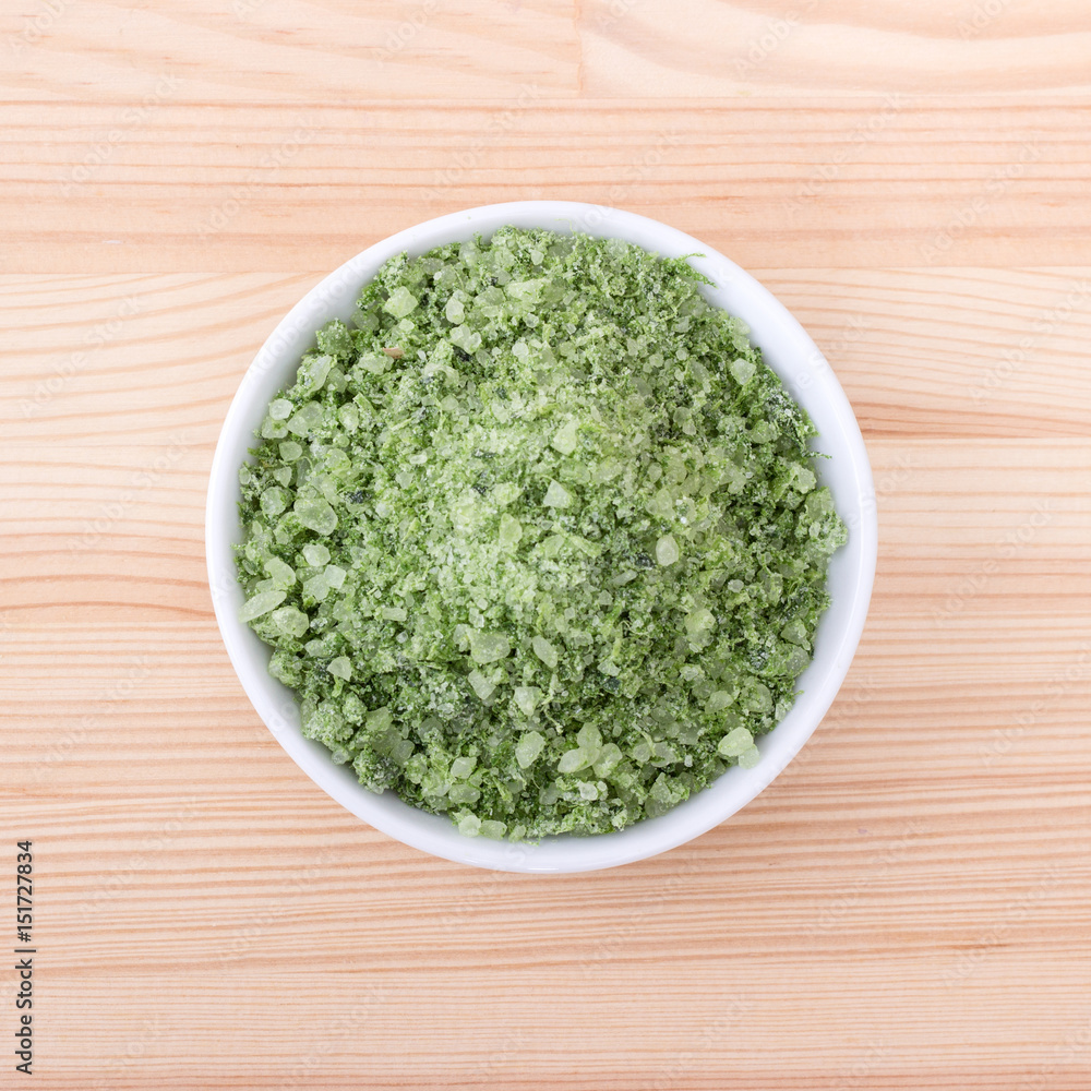 herbal salt from wild garlic / Porcelain bowl with green herbal salt of wild garlic herbal salt from wild garlic / Porcelain bowl with green herbal salt of wild garlic