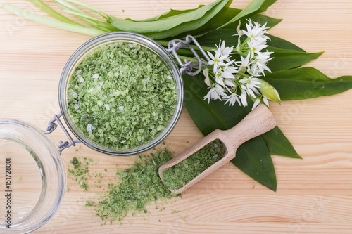 herbal salt and wild garlic / Green herbal salt of wild garlic and wooden spoon