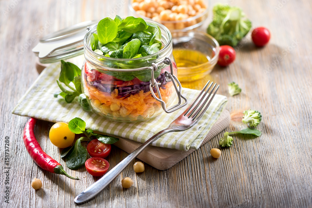 Healthy mason jar salad with chickpea and veggies, diet, vegetarian, vegan food Healthy mason jar salad with chickpea and veggies, diet, vegetarian, vegan food