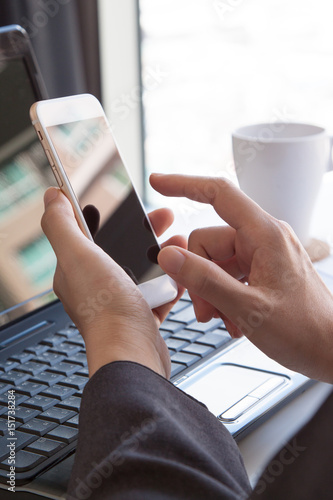 Wallpaper Mural Business people using mobile phone technology. Typing smartphone screen. business man hands busy using cell phone at office desk, young male student typing on phone sitting at wooden table,  Torontodigital.ca