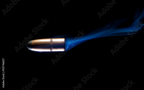 Smoke behind a copper plated bullet