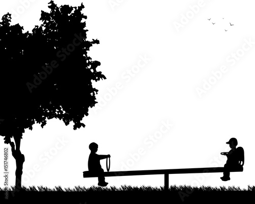 The boys are bouncing on the children's playground on the teeter,one in the series of similar images silhouette