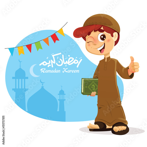 Young Muslim Boy Holding Quran Book