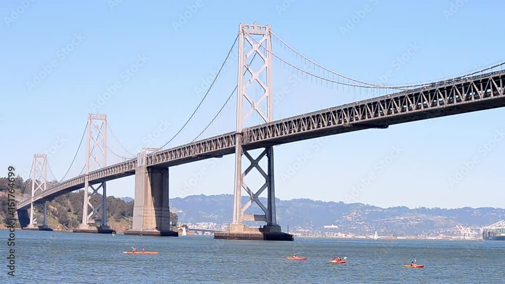 San Francisco-Oakland Bay Bridge in sunny day in San Francisco, California, USA San Francisco-Oakland Bay Bridge in sunny day in San Francisco, California, USA