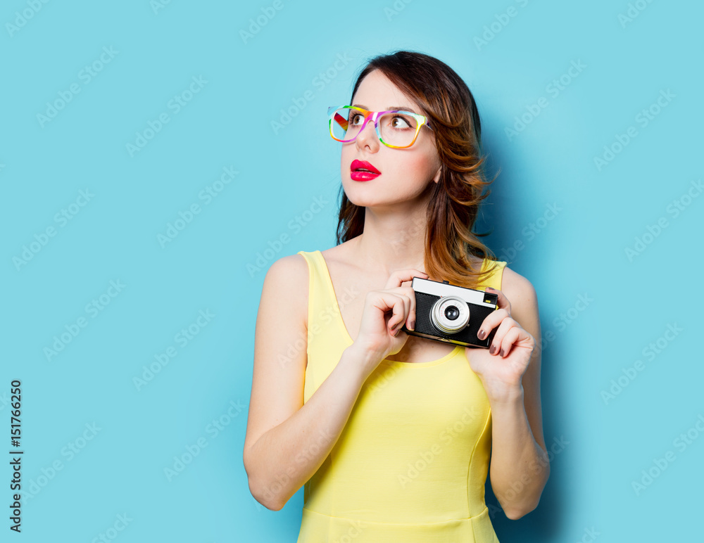 young woman with camera young woman with camera