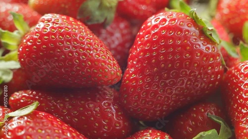 Pile of red fresh sweet strawberries macro video