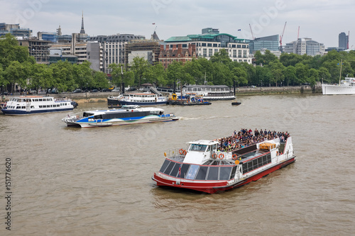 Fotografie A pleasure cruiser on the River Thames, London, England, U.K