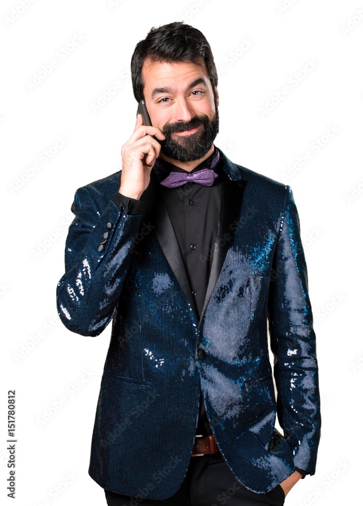 Handsome man with sequin jacket talking to mobile Handsome man with sequin jacket talking to mobile