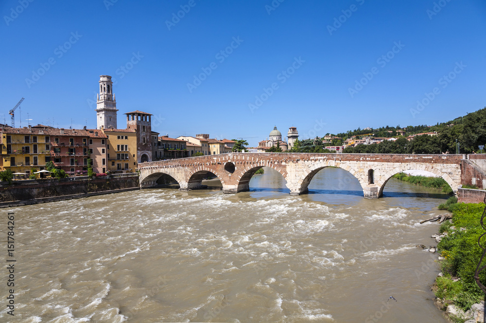 old roman bridge Ponte di Pietra in Verona  spans the river Etsch