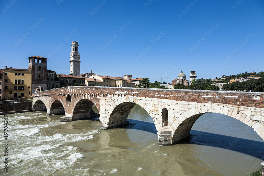 old roman bridge Ponte di Pietra in Verona  spans the river Etsch