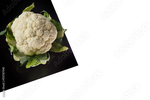 Cabbage on Black Sheet Isolated on white photo