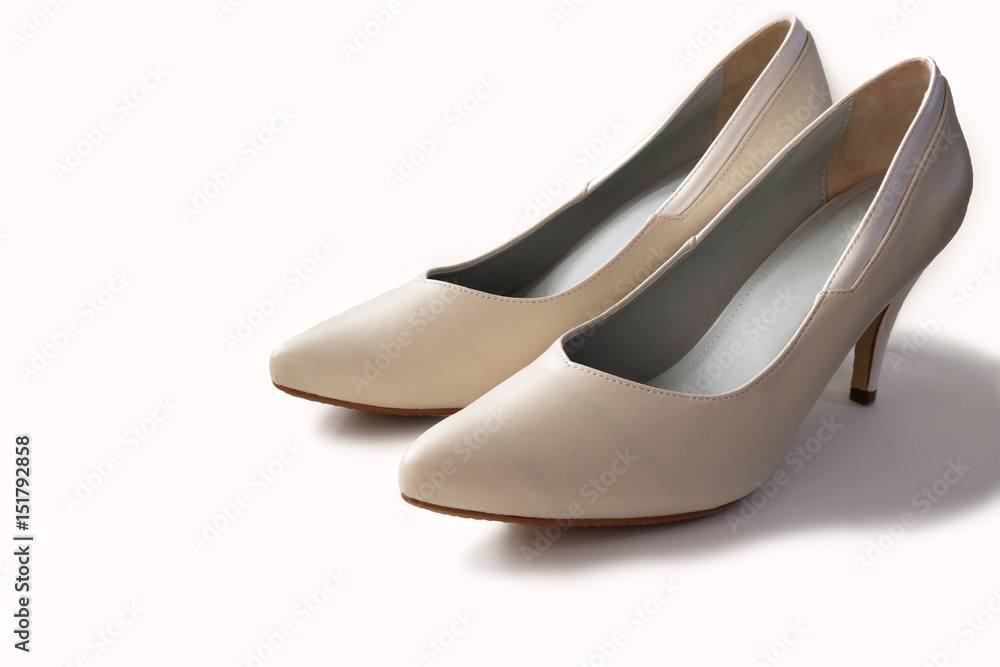 White leather high heels isolated on white background White leather high heels isolated on white background