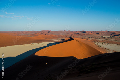 Climbing Big Daddy Dune during Sunrise  Looking onto Sossusvlei Salt Pan  Desert Landscape  Namibia