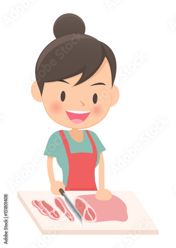 料理をする主婦　肉を切る
