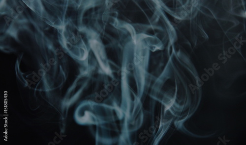 smoke floating without direction on black background