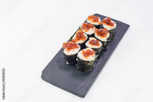 Maki sushi rolls with tuna isolated on a white background photo